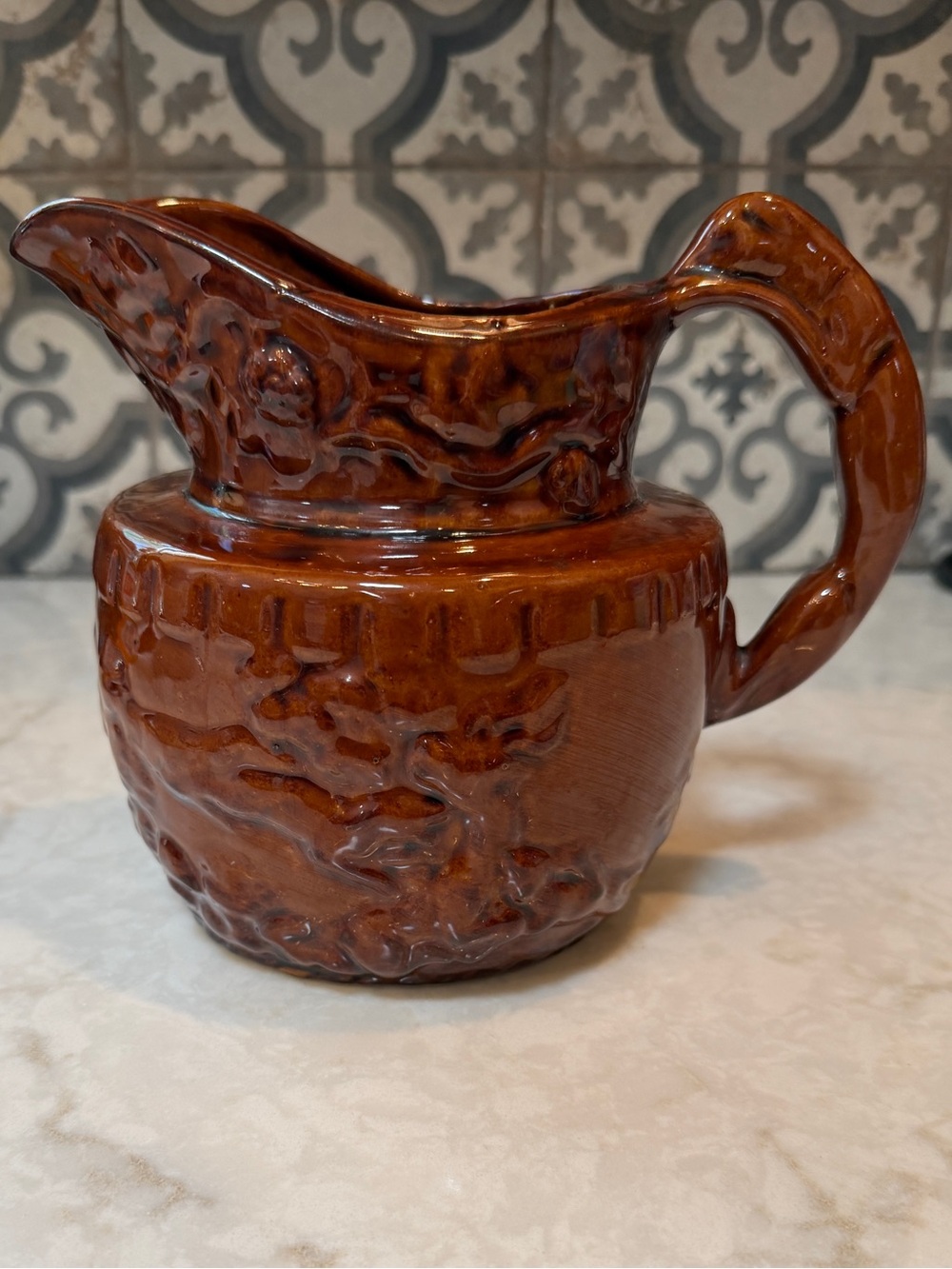 Antique Rockingham Bennington Pottery Brown Glazed Embossed Scene Pitcher- EUC